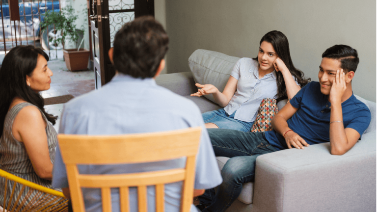 Couple Conversing with Family About IVF